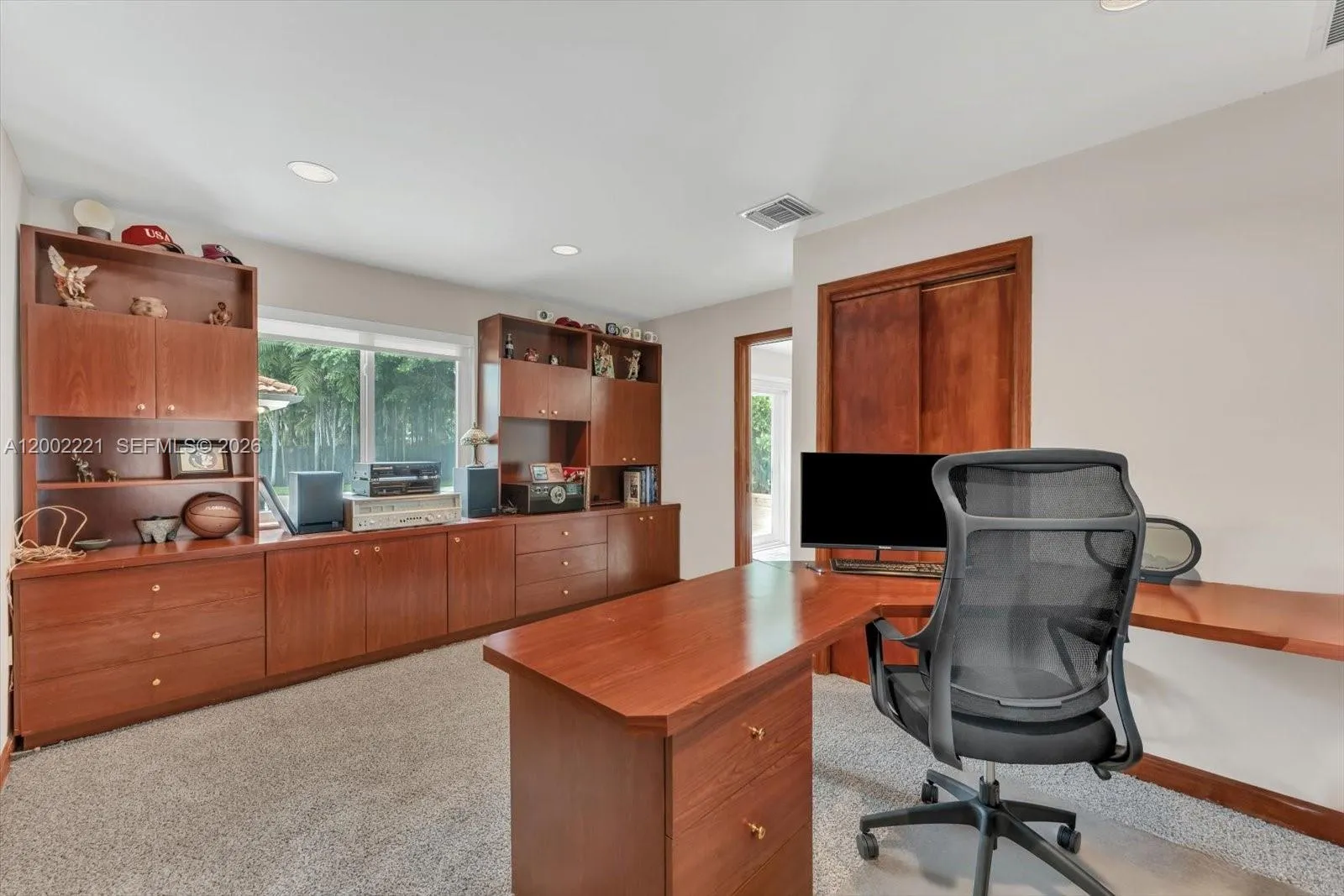 This is the 5th bedroom being used as an office