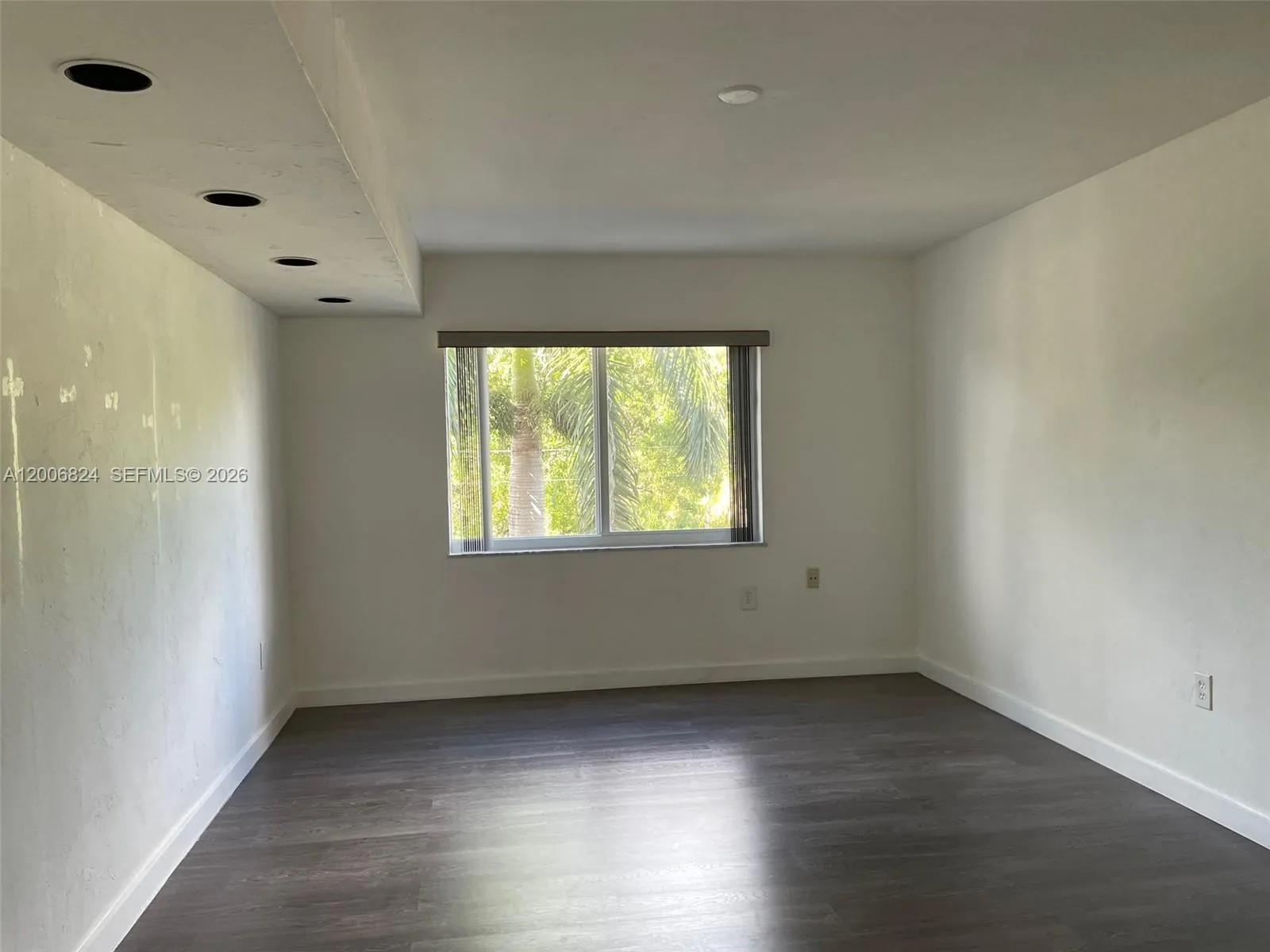 Bedroom with Ceiling Lights & Wood Like Floors