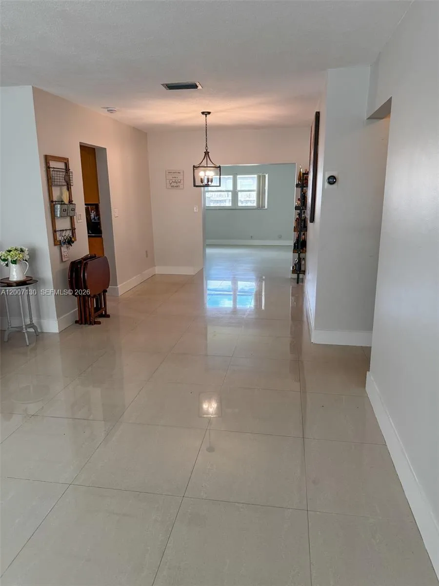 part if living room, dinning area with a view of the family room