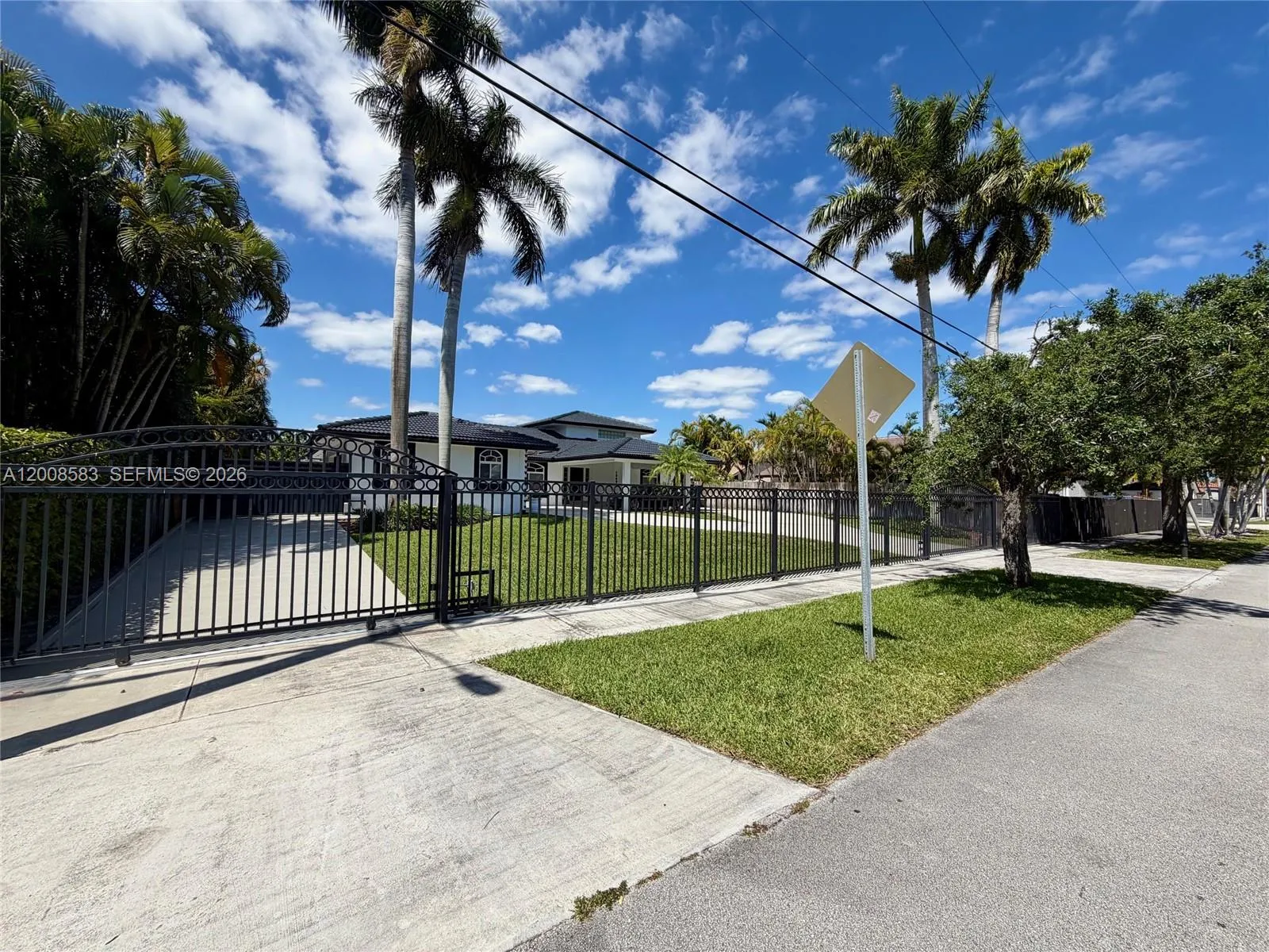 Left driveway and side gate