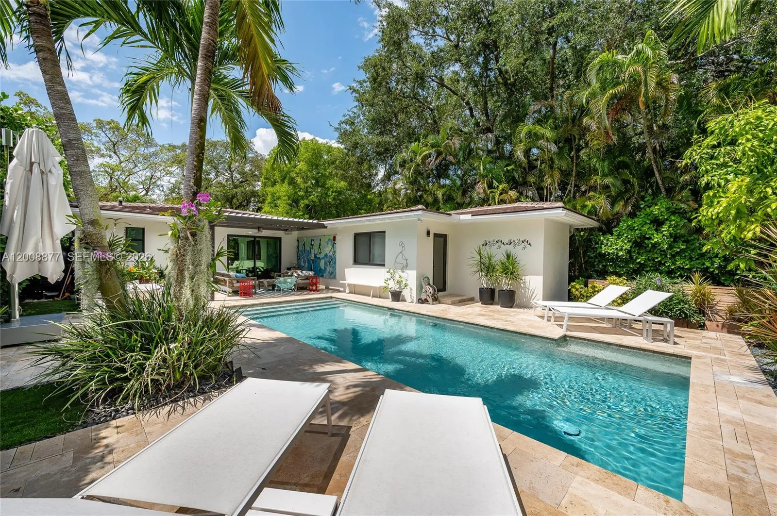 Pool showing deck & landscape