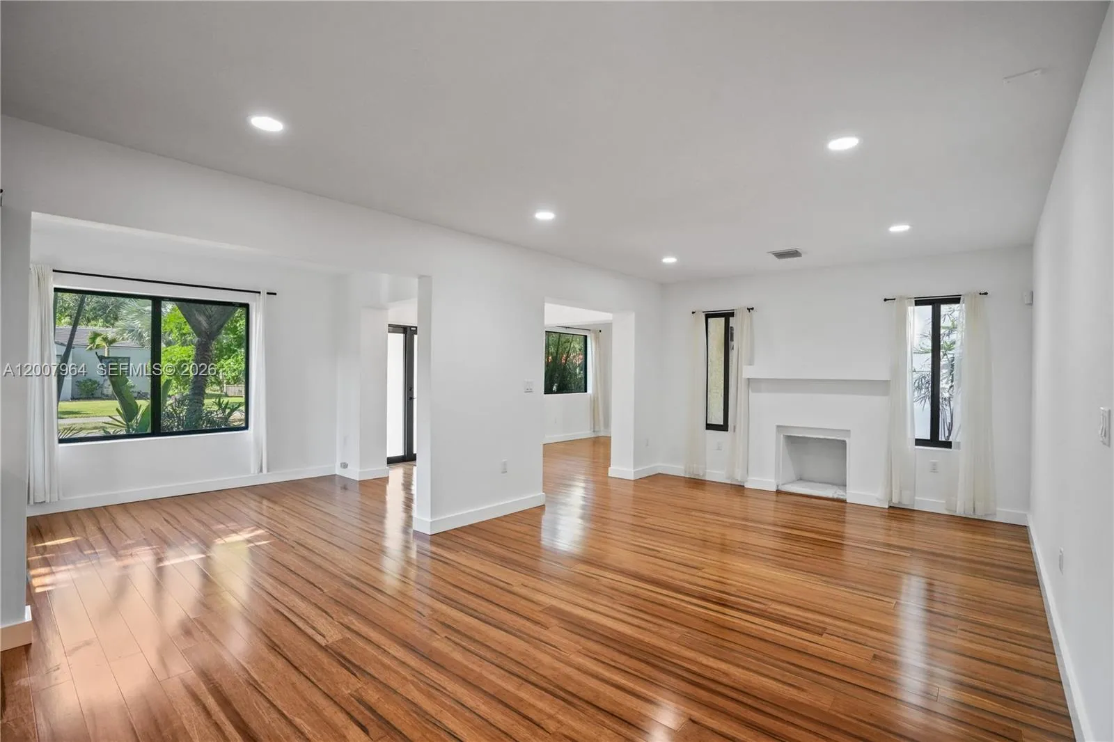 Beautiful, open living room with bamboo flooring