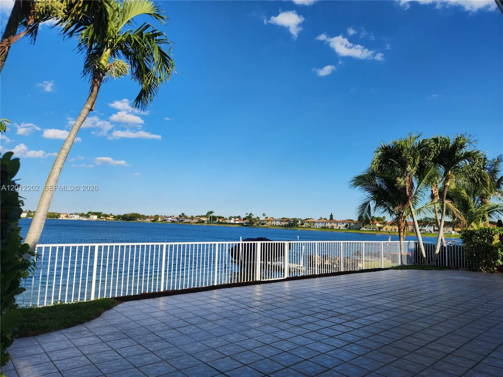 Spacious patio with a paradise view perfect for outdoor entertaining and relaxing.