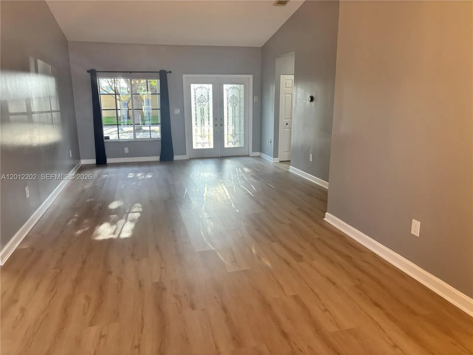 Open concept living room with natural lighting