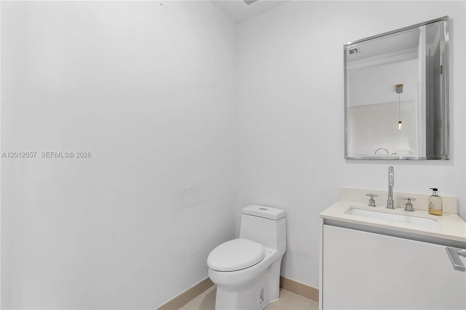 Guest Bathroom.\r\nUnit will be freshly painted prior to closing, delivering the residence in clean, move-in ready condition.