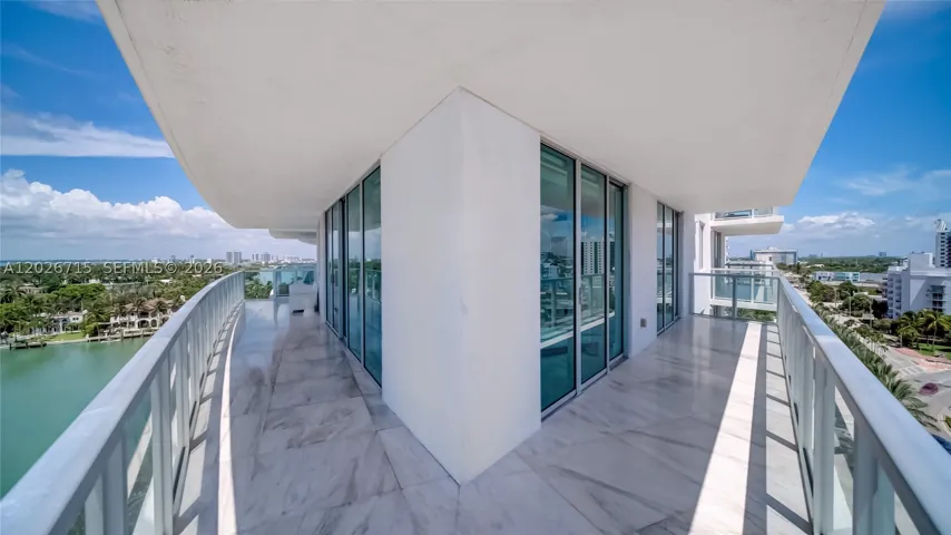 Wraparound balcony can be accessed through the master suite and second bedroom as well as the kitchen and living room.