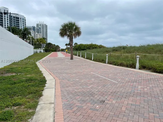 Beach boardwalk behind building