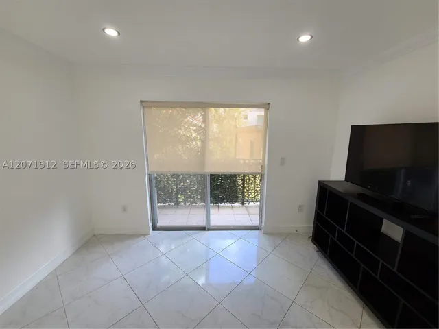 From middle of living room looking towards balcony