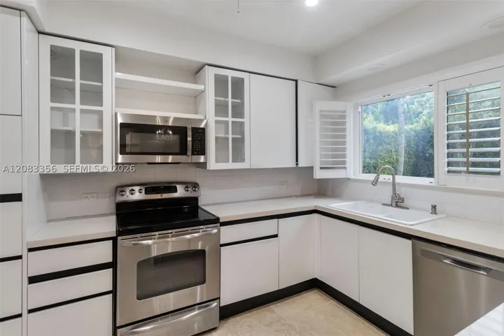 Generous Counter Space and Pool Views From All Kitchen Angles