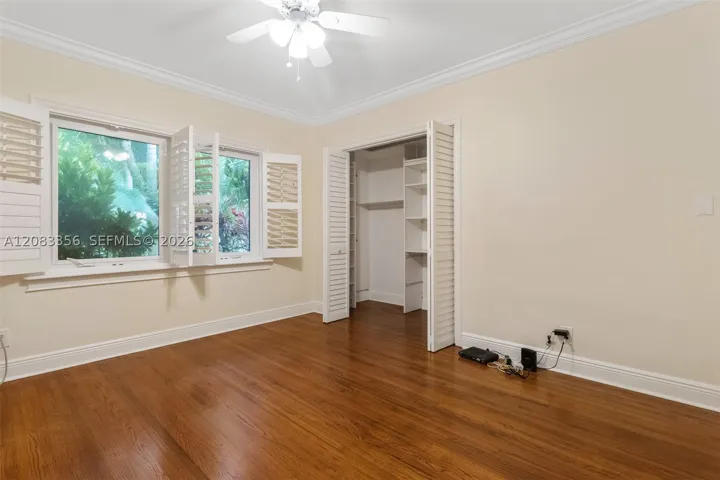 3rd Bedroom with Garden Views and Natural Wood Floors
