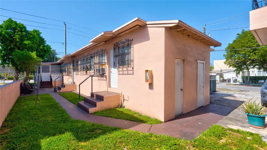 Triplex.  the doors on right are the meter room and a storage room