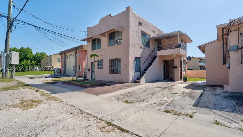 Duplex built in 1937. first floor unit is 2/2. A wall opening was enclosed & it is currently rented as 1/1 studio & 1/1 apartment . Violation requires to be returned to original . 2nd floor is a 2/1