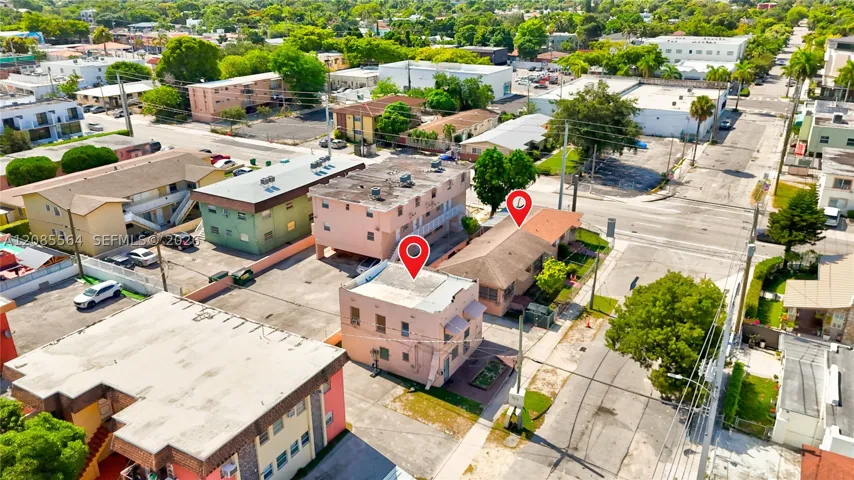625 SW 18 Ave - corner lot Fiveplex consisting of two story duplex built in 1937 and one story triplex built in 1954
