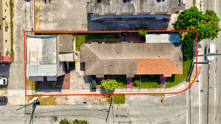 Lot with existing buildings - 2 story 1937 Duplex and One story 1954 Triplex