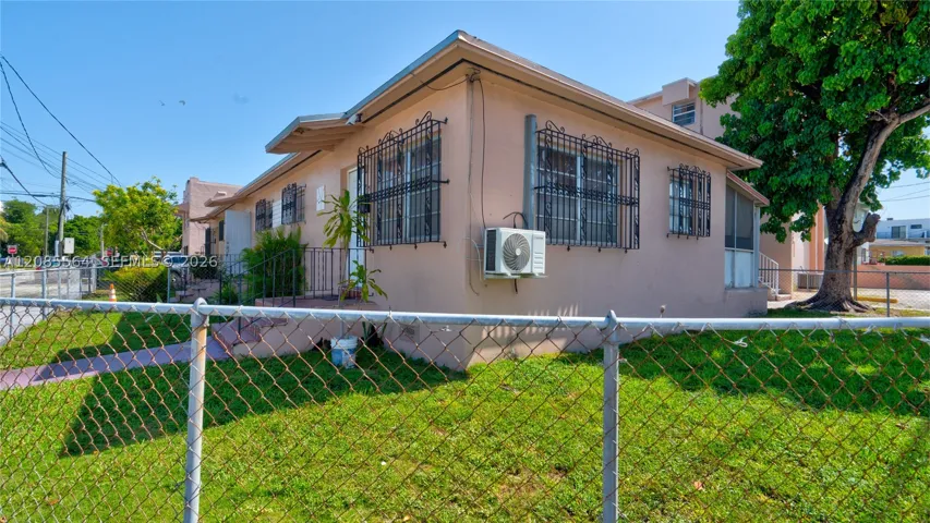 Side of Triplex on corner of 7th street and 18th Ave