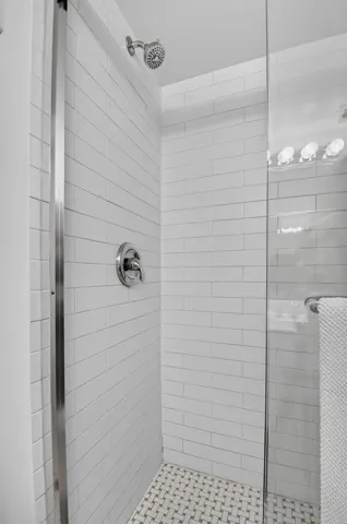TILED SHOWER IN GUEST BATH
