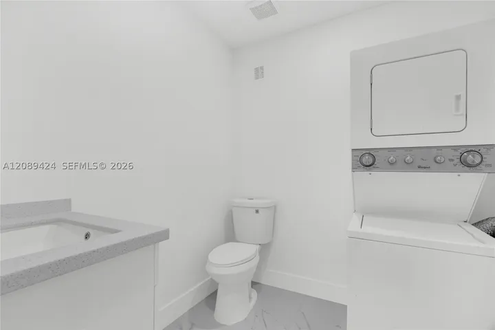 HALF BATHROOM/LAUNDRY ROOM