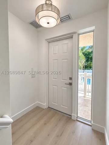 ENTRY IN FRONT OF POOL (1ST FLOOR)