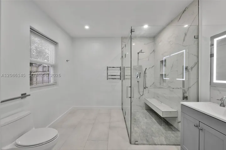 Walk-in shower with built-in seat