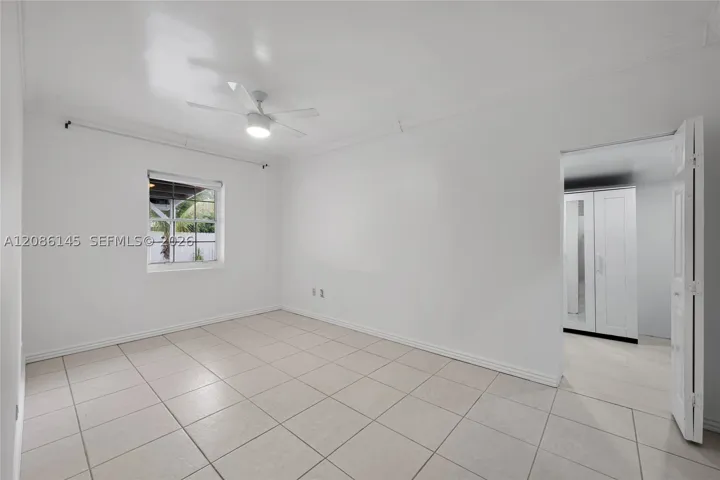 Spacious, light-filled primary bedroom