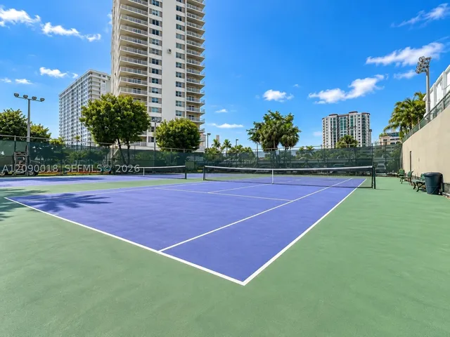 On-site tennis courts available for residents.