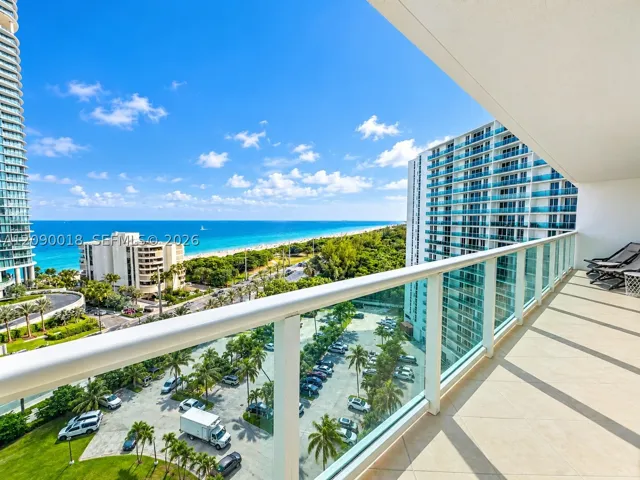 Expansive private balcony with stunning ocean and water views.