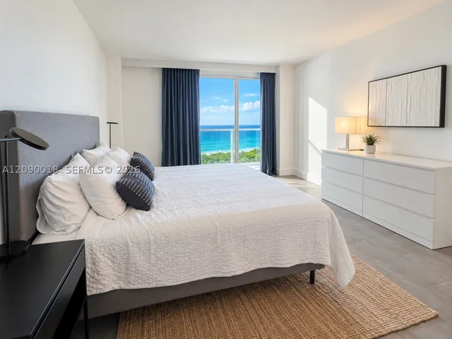 Spacious primary suite featuring a comfortable king bed.