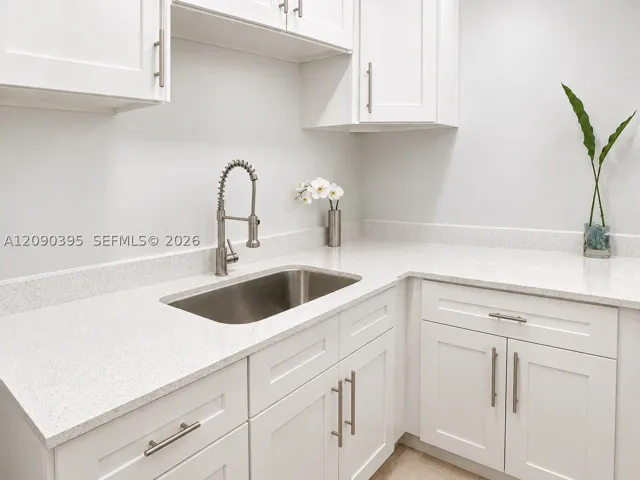 Kitchen has a two-burner portable electric cooktop, micro, fridge/freezer.