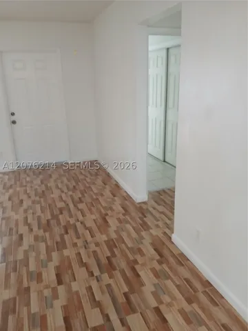hallway entrance to other bedroom and 2nd bathroom