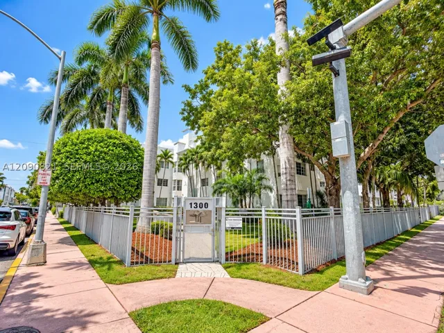 Gated entry and lush green exterior along Pennsylvania Avenue.