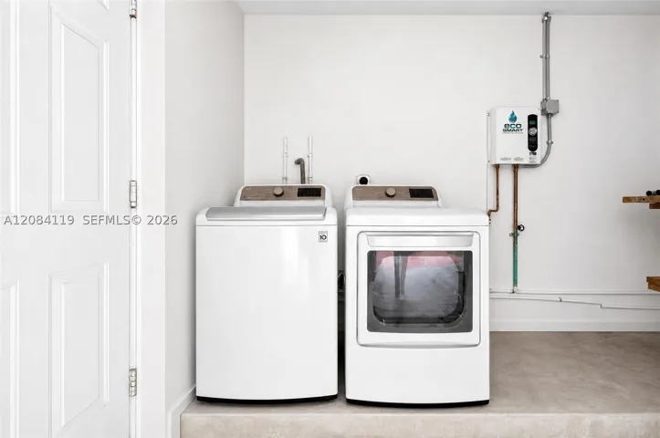 Full size washer and drying inside the garage