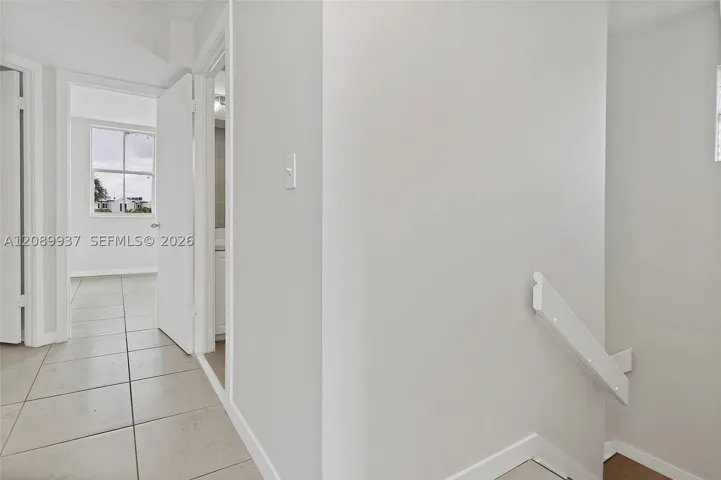 hall way to all three bedrooms