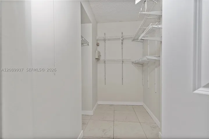 Closet for the Suite with bathroom and private balcony