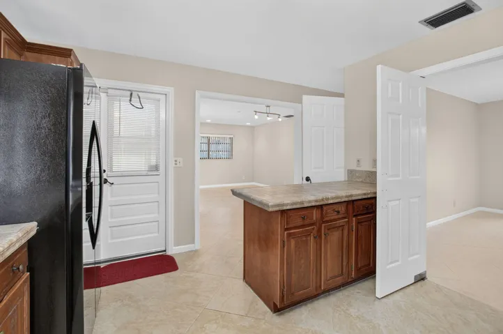 Kitchen leading to family room