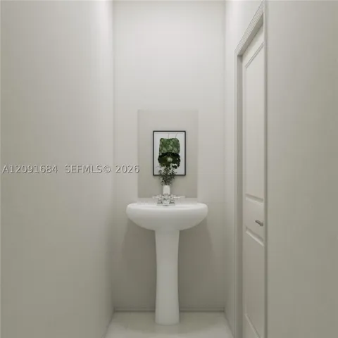 The powder room offers simple access to both guests and residents on the first floor.
