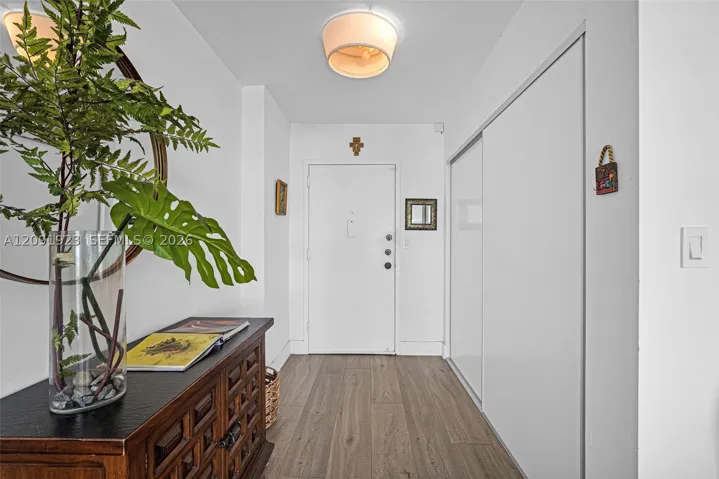Main entrance with closet space on the right !!