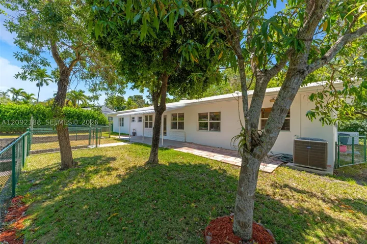 Upper tier - Mature fruit trees + covered porch