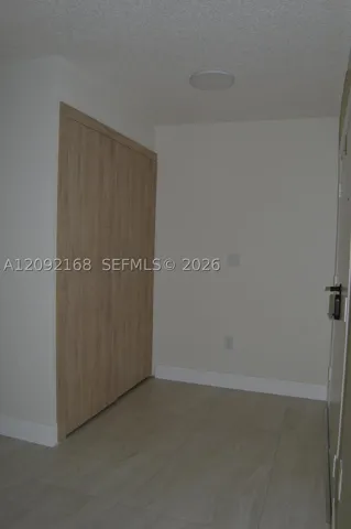 HIDDEN LAUNDRY ROOM FOR WASHER AND DRYER.