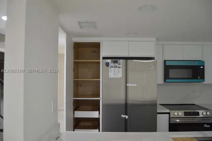 PLENTY OF KITCHEN CABINETS