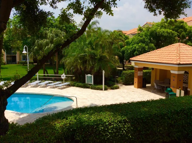 YC BACK POOL TIKI AREA WITH BBQ PICNIC