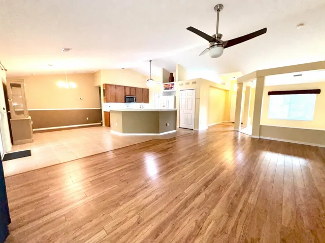living to front and kitchen