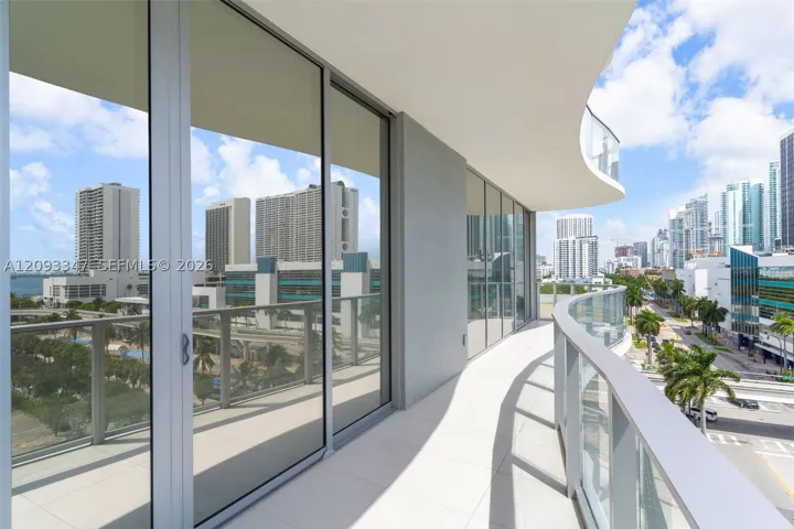 Curved terrace running the width of the corner residence on floor seven