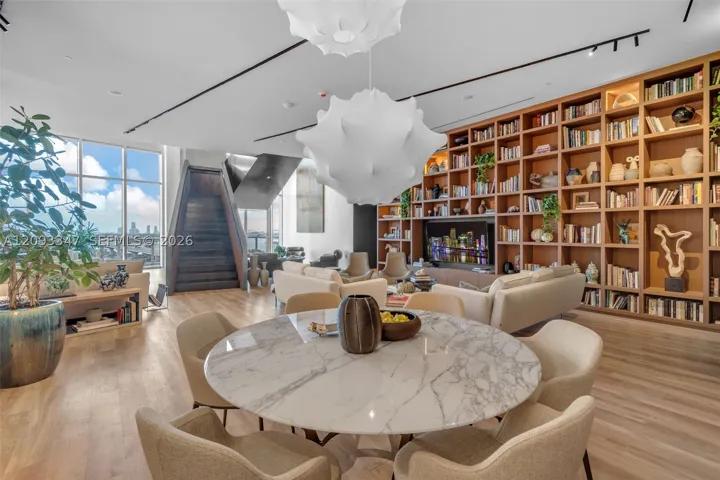Library dining table and gathering area for residents at Casa Bella