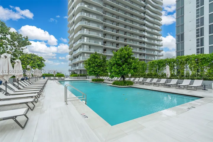 160 foot lap pool and lounge pool on the landscaped amenity deck