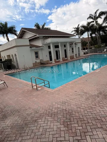 Clubhouse with pool and fitness center.