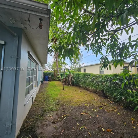 side yard left of home