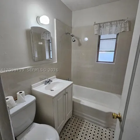 New vanity, sink, faucet and tub surround