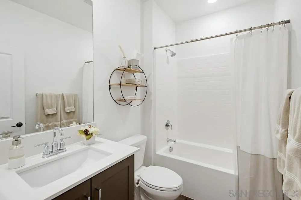 First floor full bathroom with tub/shower.