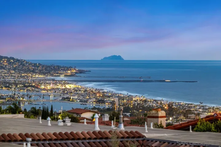 Offers 180 degrees of breathtaking sit-down panoramic white water, ocean, bay, downtown, Coronado bridge, Sea World, sunset, and twinkling skyline views. Watch the airplanes take off and land at Lindberg Field. See all the way to Mexico! (Zoomed in view)