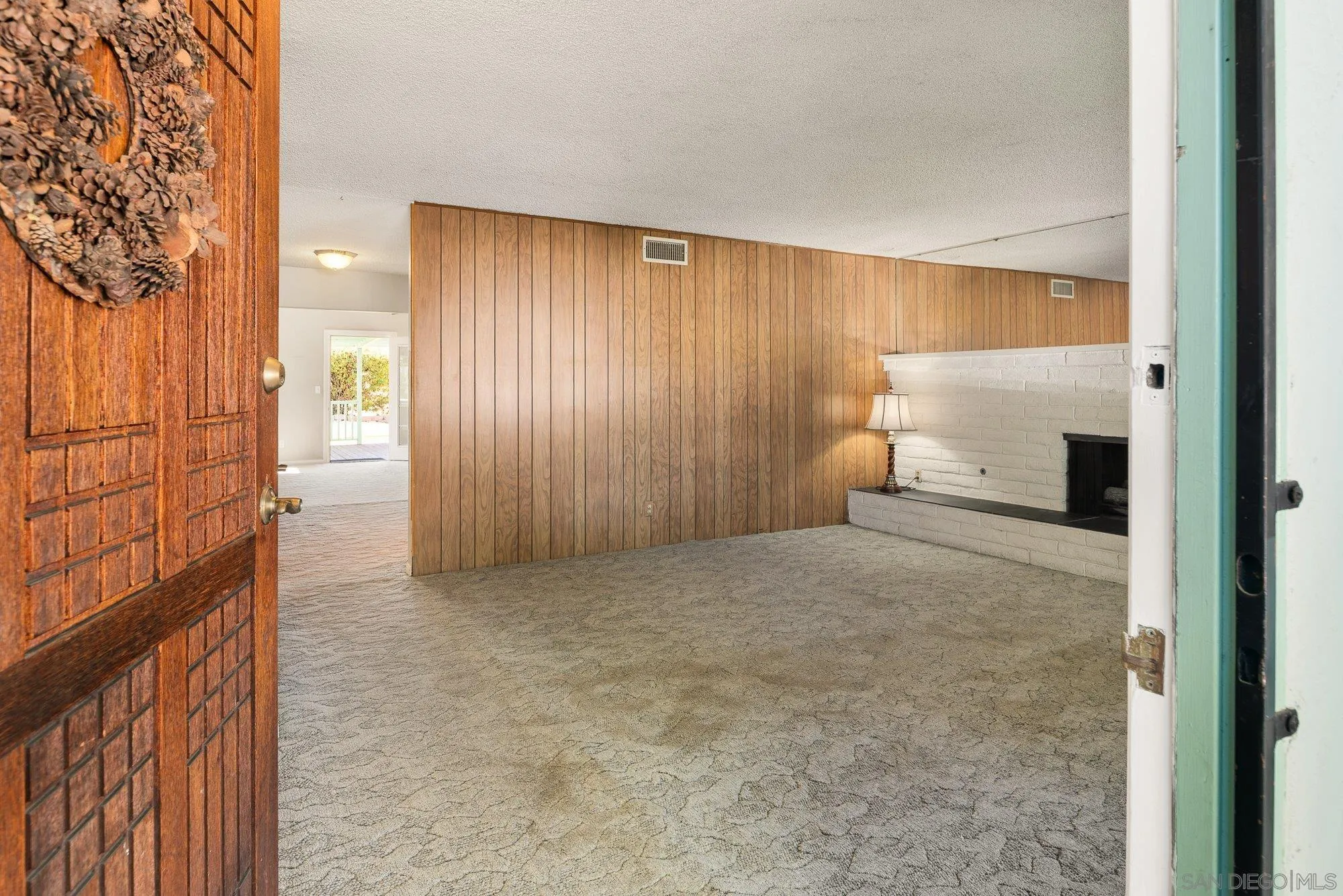 6010 Chadwick Ave, San Diego, CA 92139 Front door entry to living room.